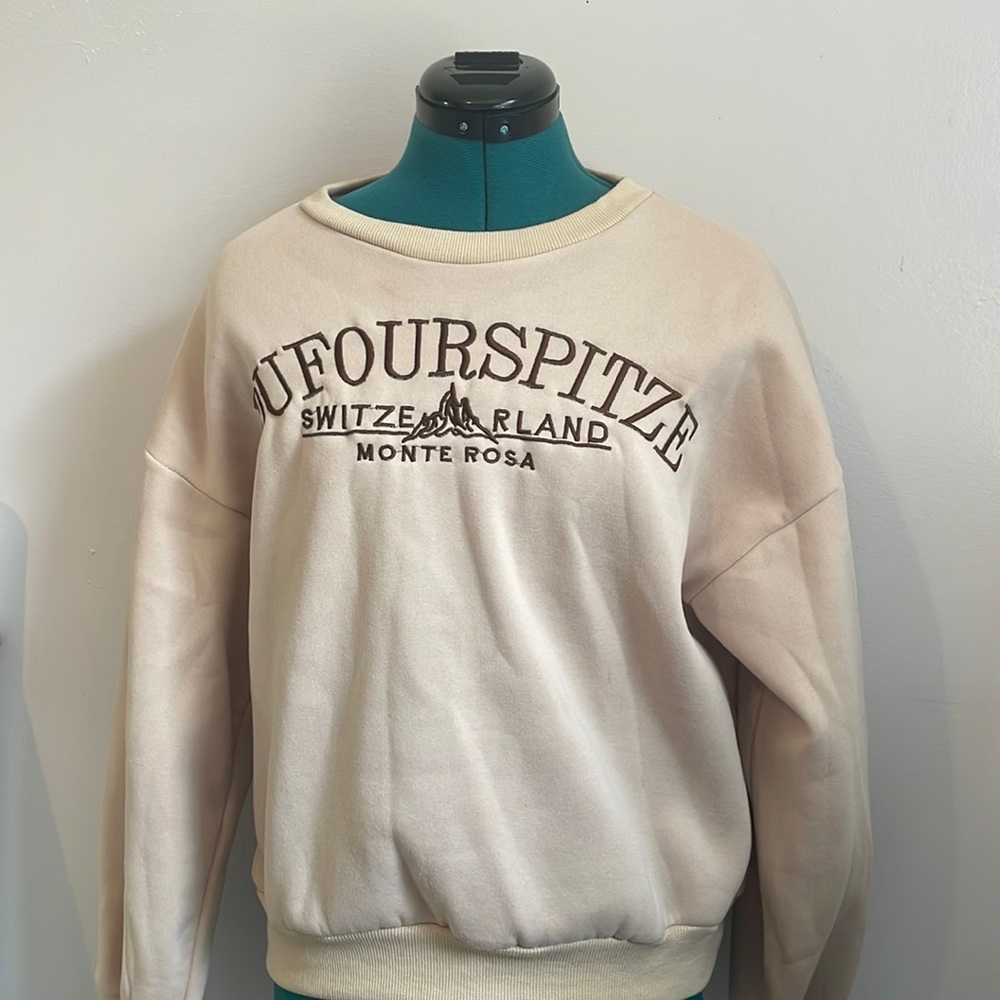 cream colored crew neck